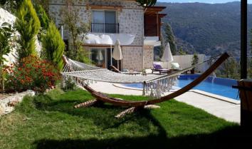Kalkan İslamlarda 2 yatak odalı jakuzili muhafazakar kiralık villa 
